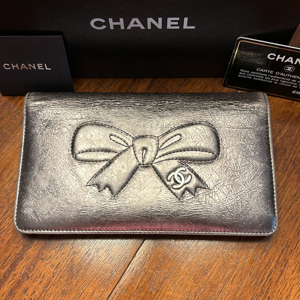 silver metallic CC bow wallet Authentic